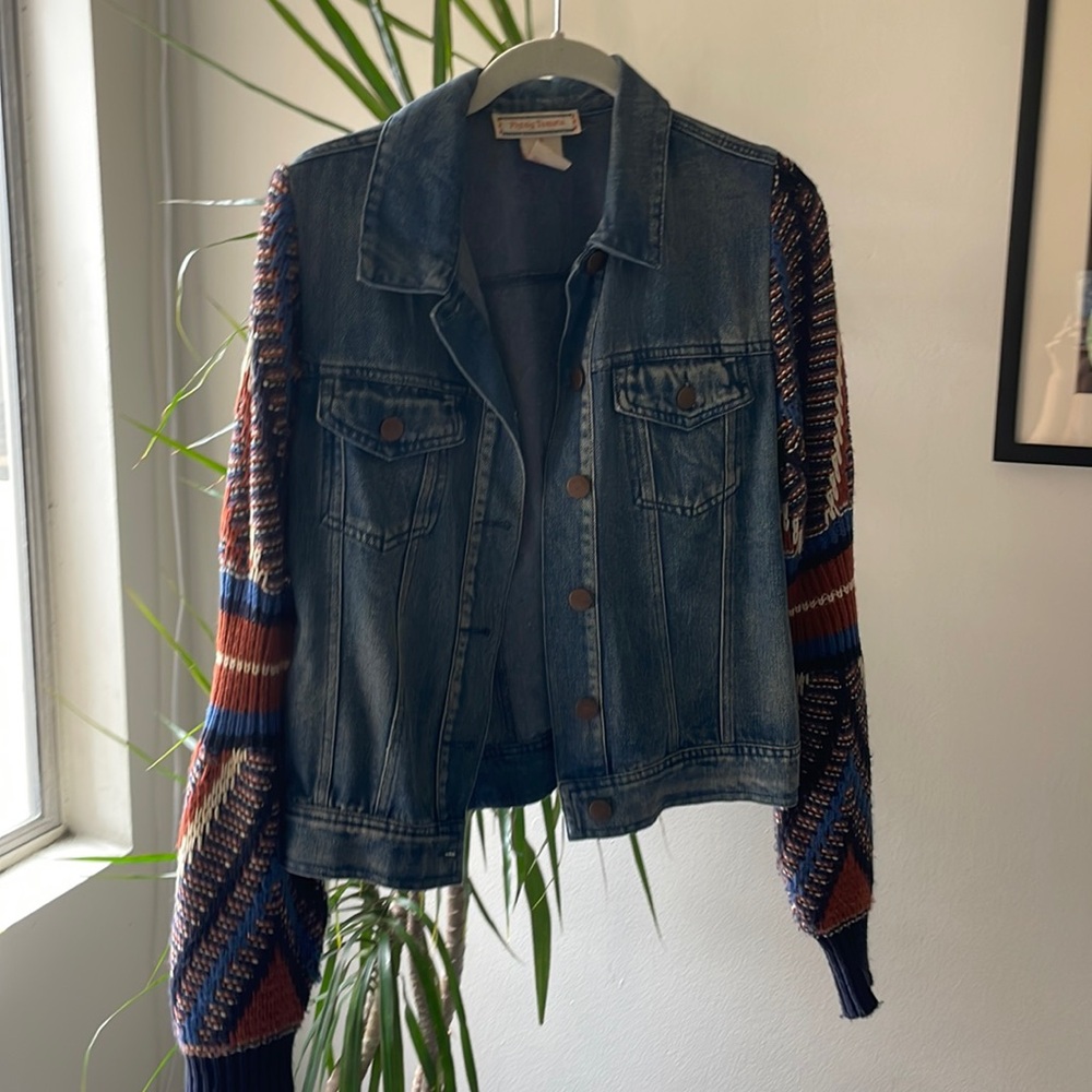Denim jacket with knit sleeves
